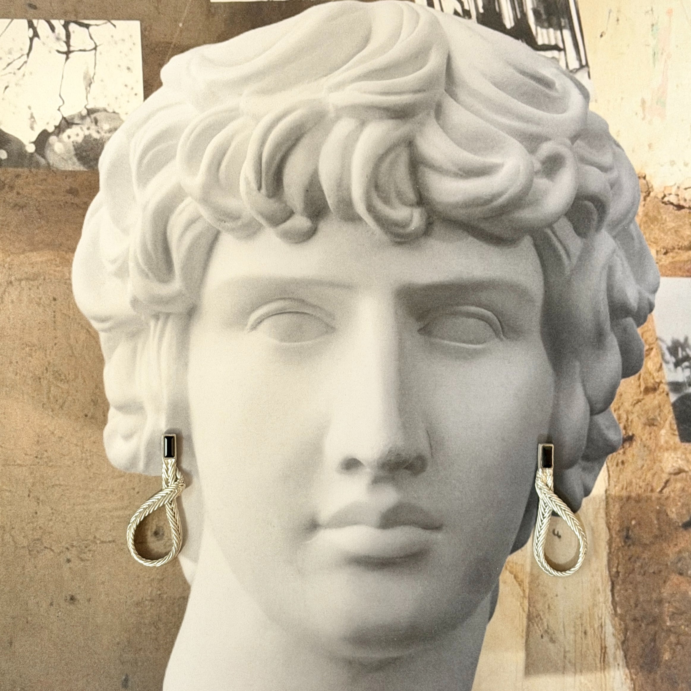 Greek bust wearing Kefi jewelry