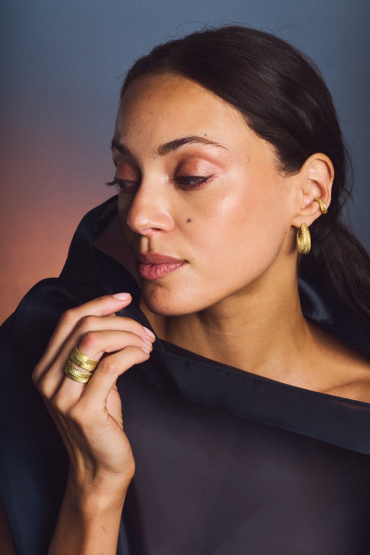 Model wearing Heritage Collection pieces in gold vermeil