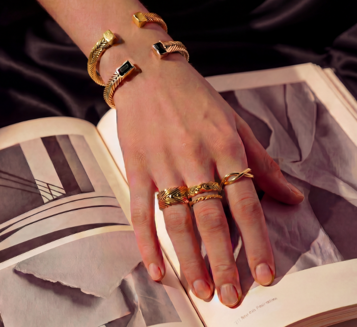 Model wearing Braided Ring in gold vermeil, showcasing handwoven braided band and refined finish