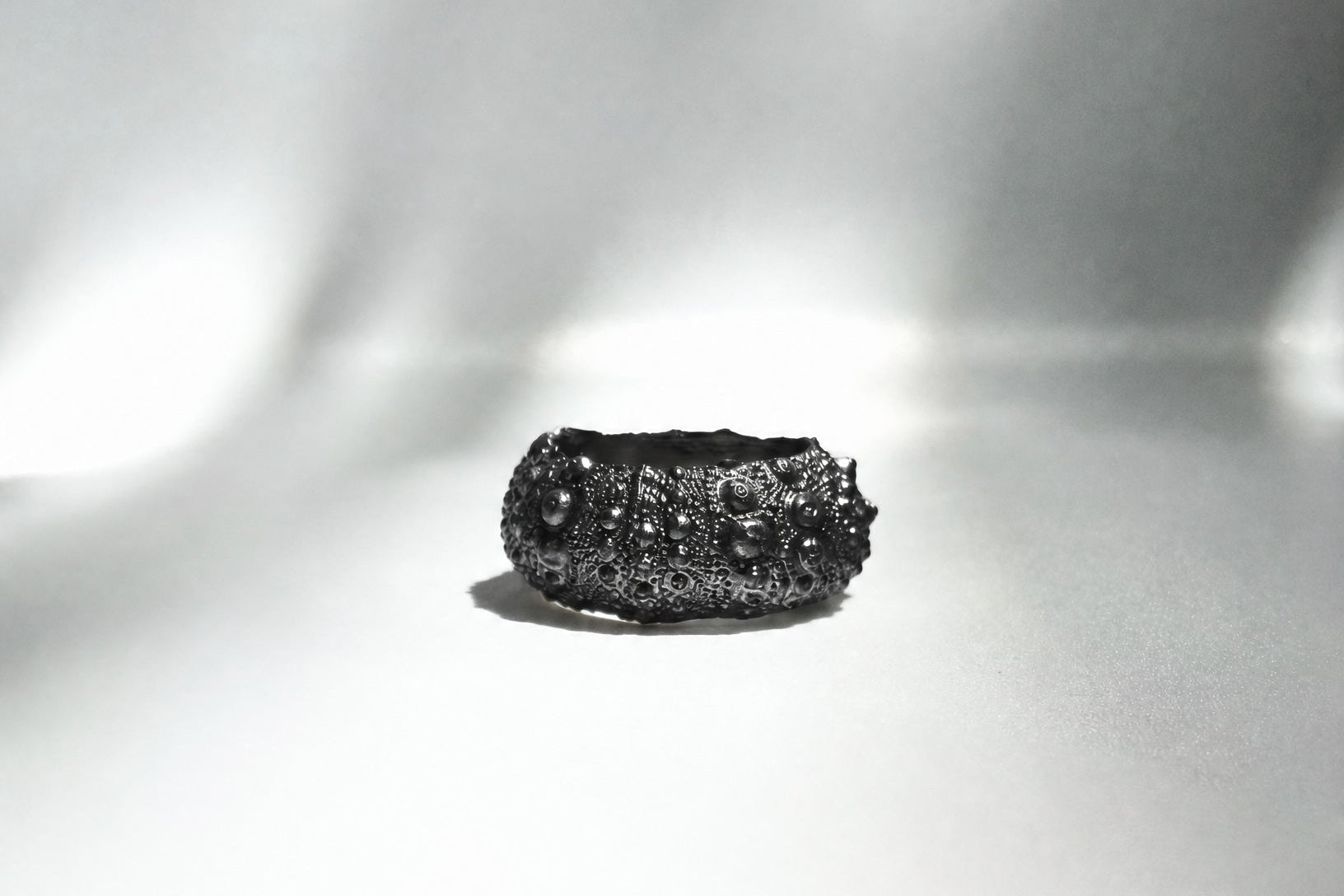 Galene Bold Urchin Ring in oxidized sterling silver featuring a sculptural sea urchin-inspired texture and organic coastal design, handcrafted in New York City.
