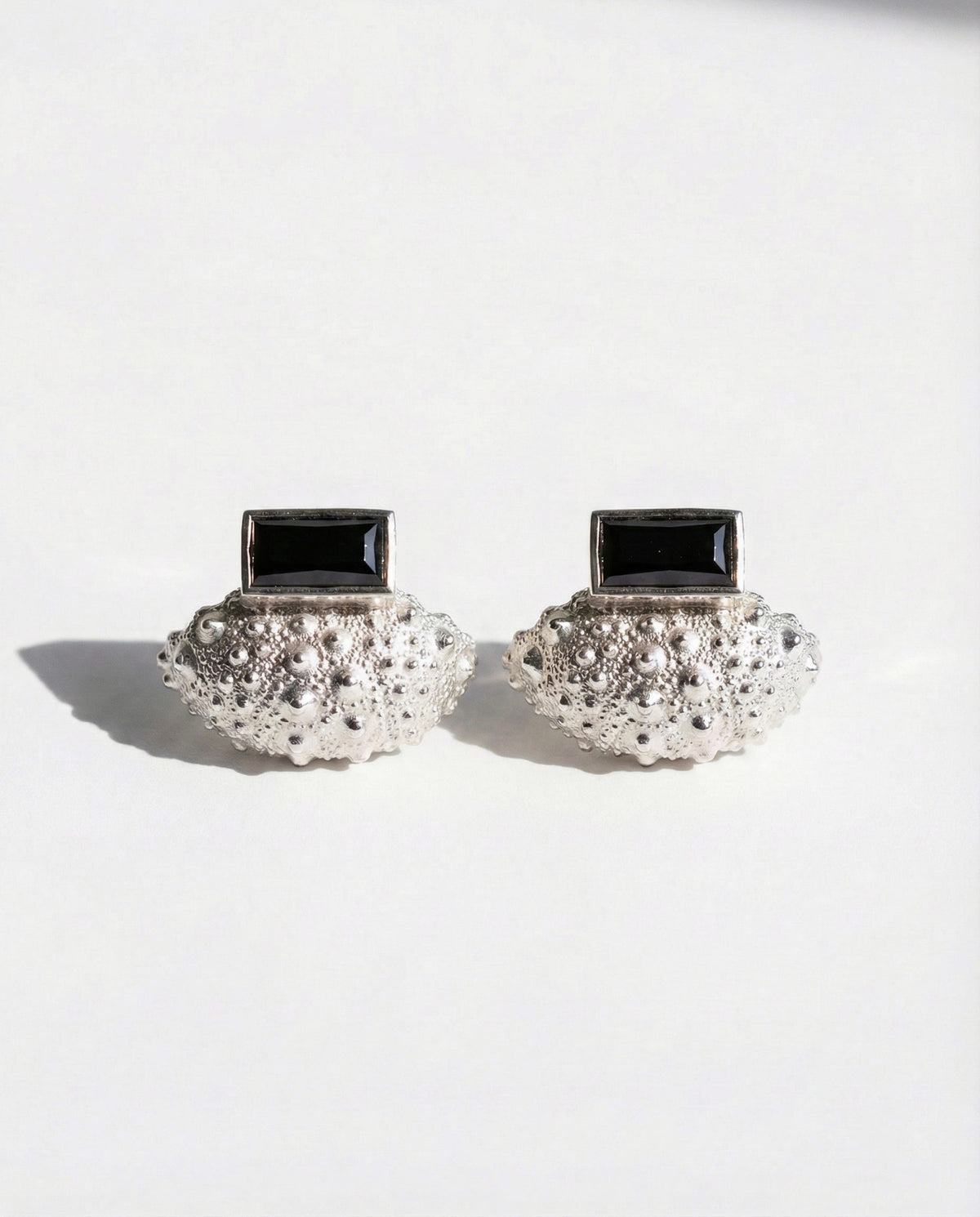 Ceto Urchin Earring Jacket Set in sterling silver, a sea urchin ear jacket paired with a black spinel post