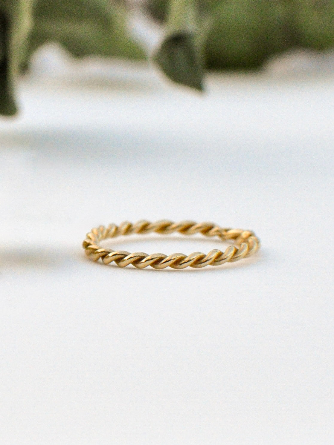 Delicate Twist Ring in gold vermeil, a fine handwoven twisted band for stacking, handcrafted in New York City by Kefi