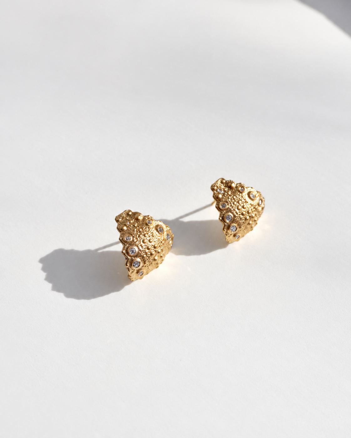 Galatea Urchin Hug Earrings in gold vermeil with flush-set diamonds, lightweight earrings cast from a sea urchin shell that hug the earlobe, handcrafted in New York City by Kefi
