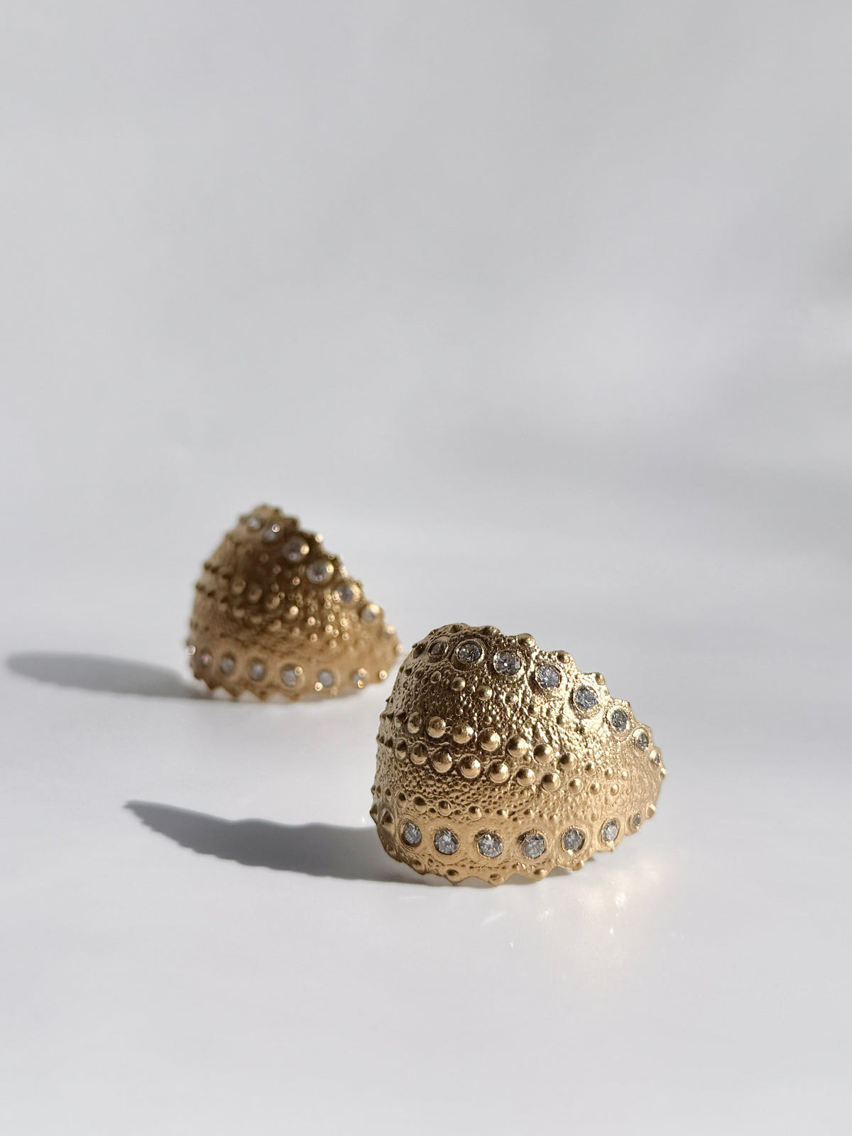 Galatea Urchin Statement Earrings in gold vermeil with flush-set diamonds, cast from a sea urchin shell, handcrafted in New York City by Kefi