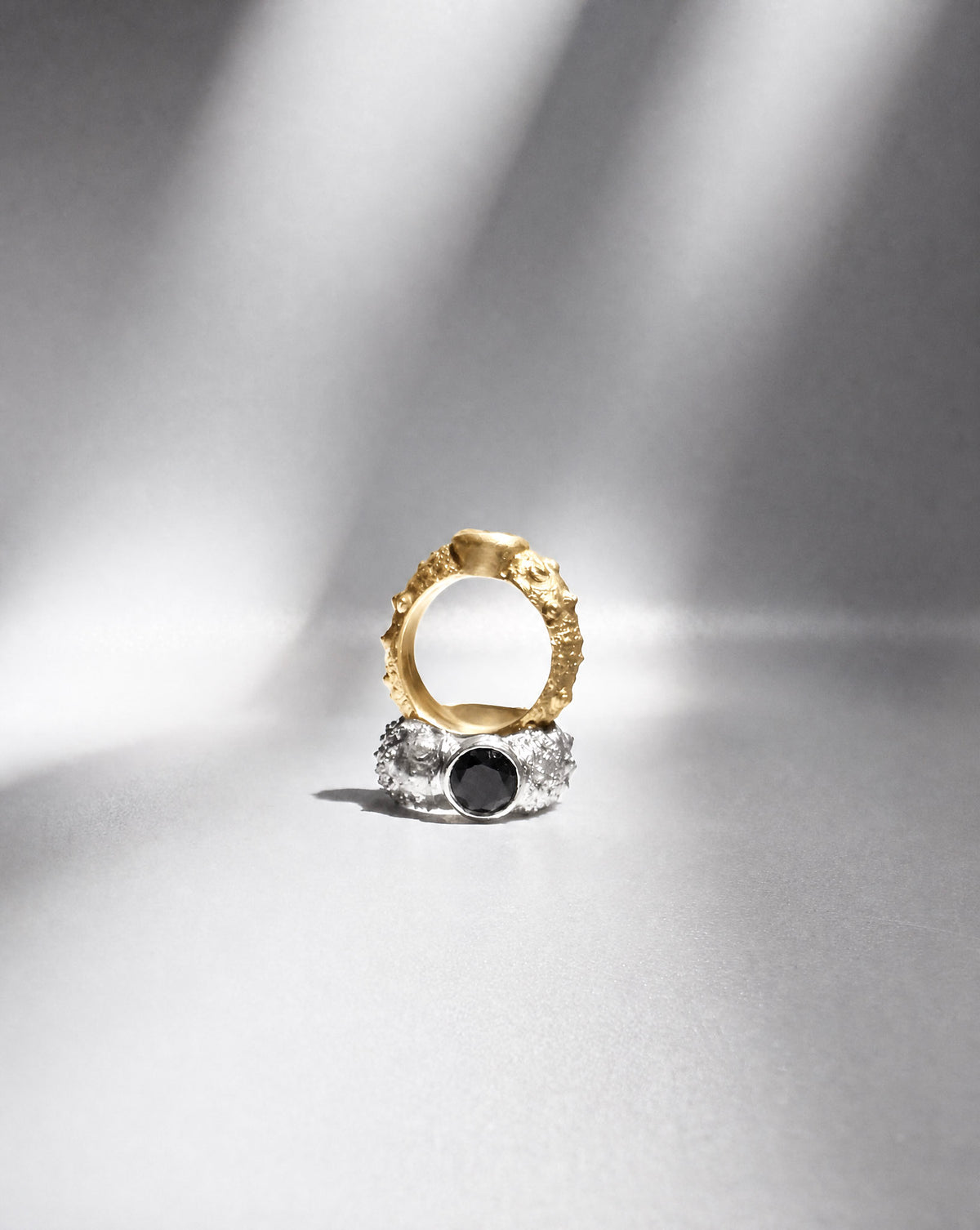 Galene Urchin Stone Rings in gold vermeil and sterling silver, each bezel set with black spinel