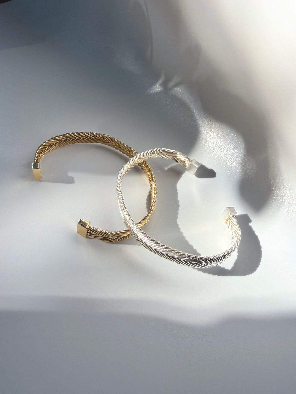 Persephone Woven Cuffs in sterling silver and gold vermeil, slim handwoven cuff bracelets cast from woven wax wire, handcrafted in New York City by Kefi
