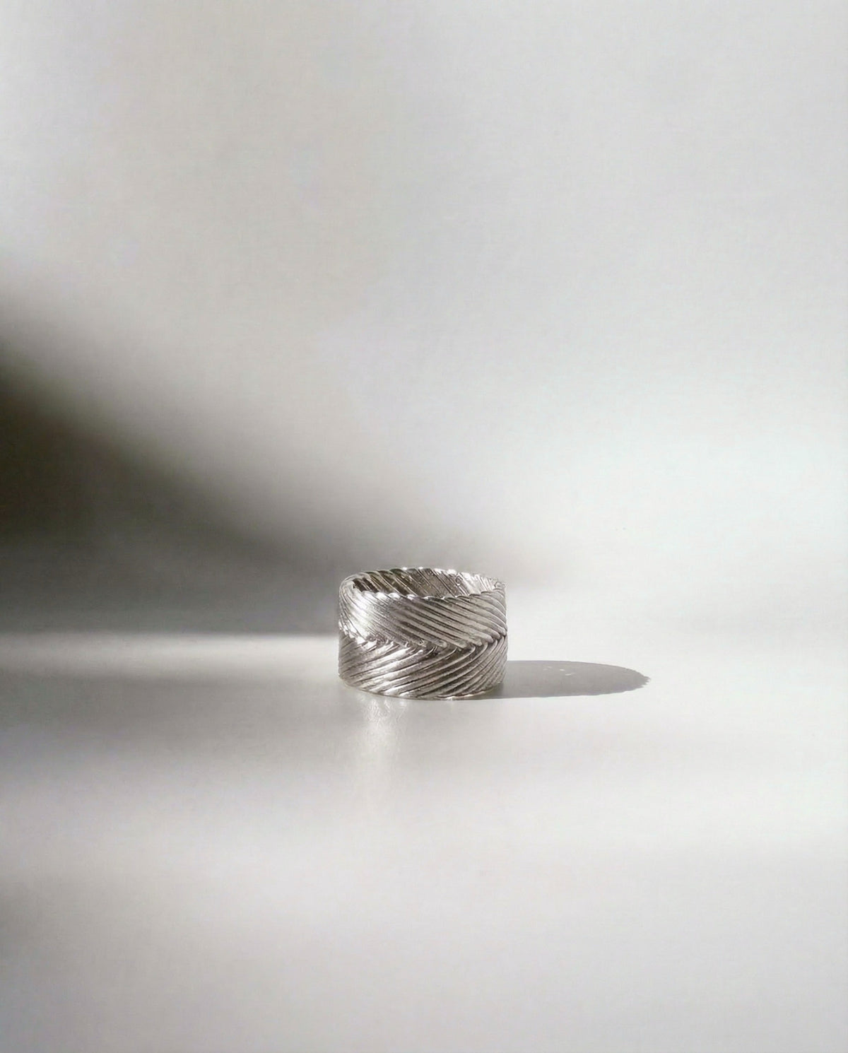 Tall Woven Ring in sterling silver, a wide band with handwoven chevron texture