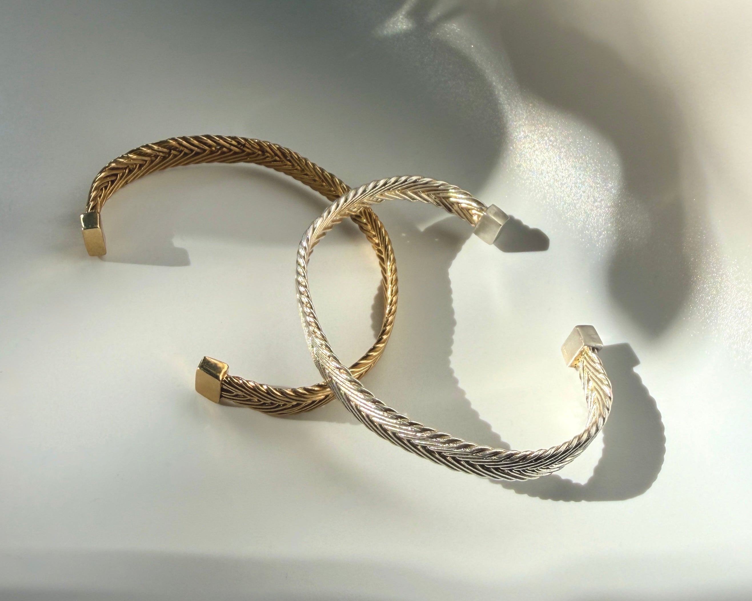 Persephone Woven Cuff in sterling silver and gold vermeil with intricate handwoven texture and structured silhouette