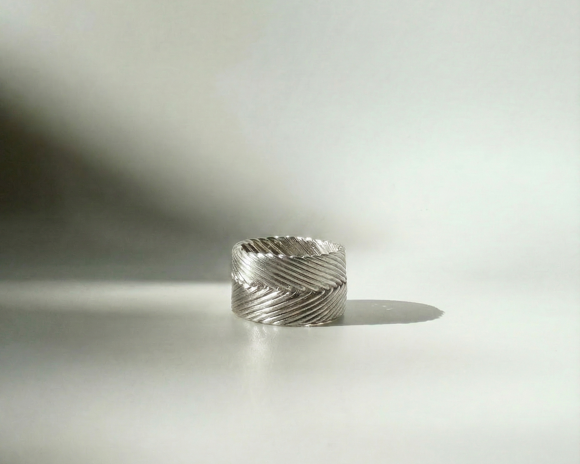 Tall Woven Ring in sterling silver with handcrafted woven band detail