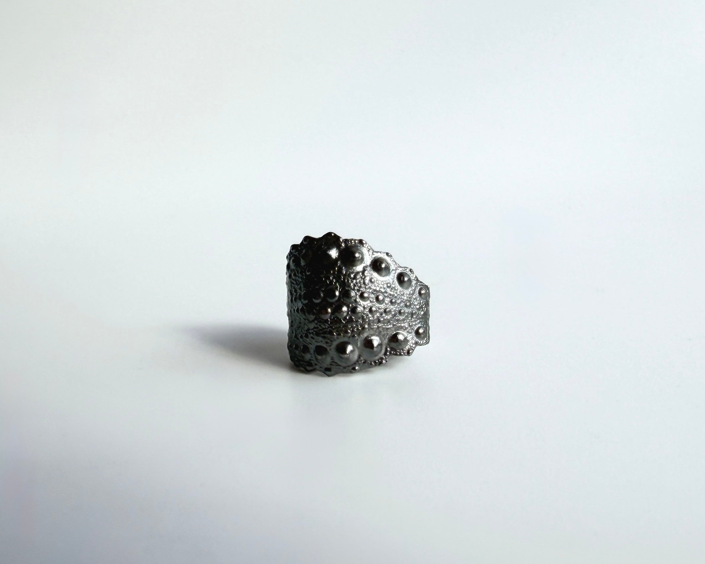 Urchin Cuff in oxidized sterling silver with natural sea urchin texture and bold cuff form