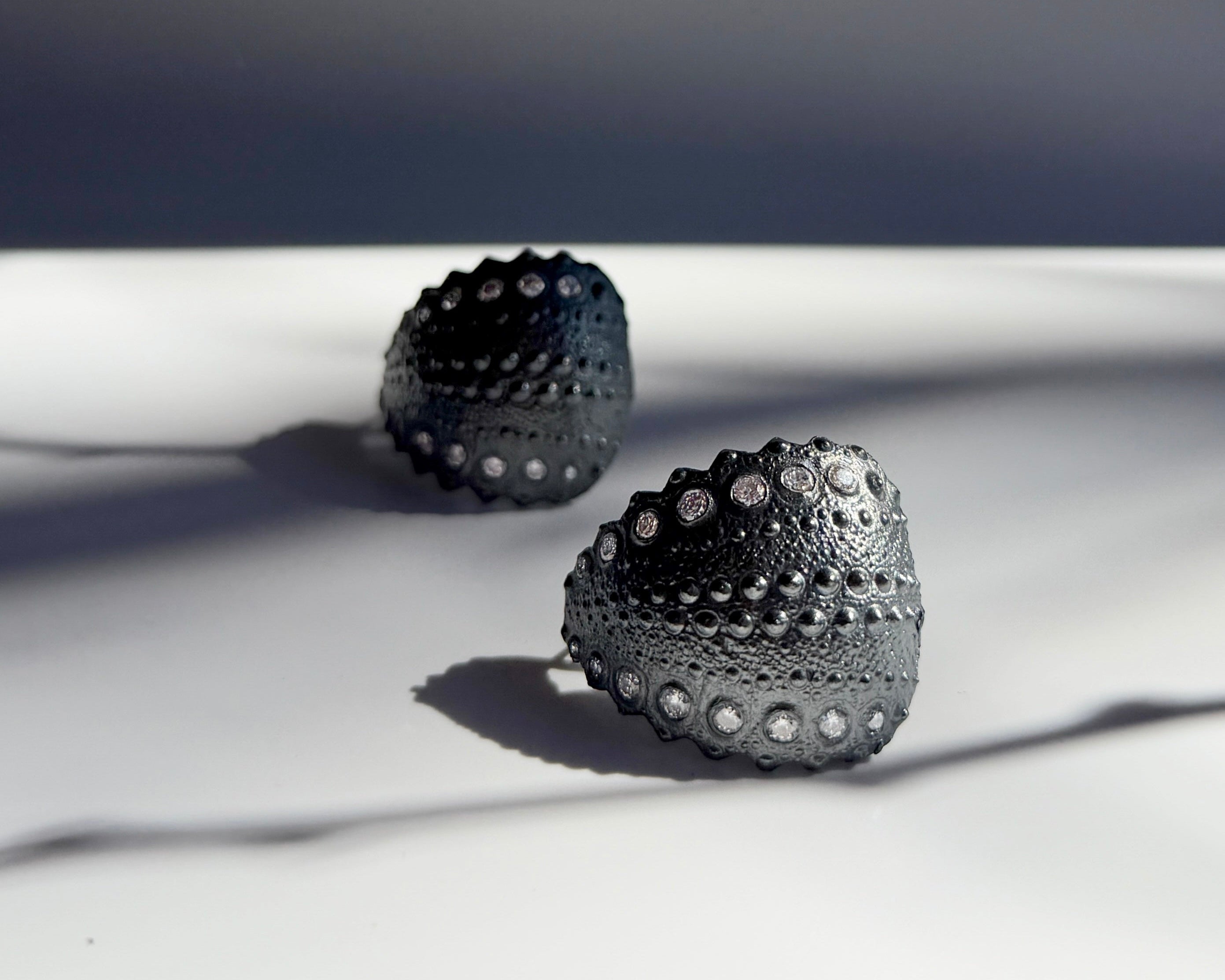 Urchin Hoop Earrings in oxidized sterling silver with natural sea urchin texture and sculptural hoop form