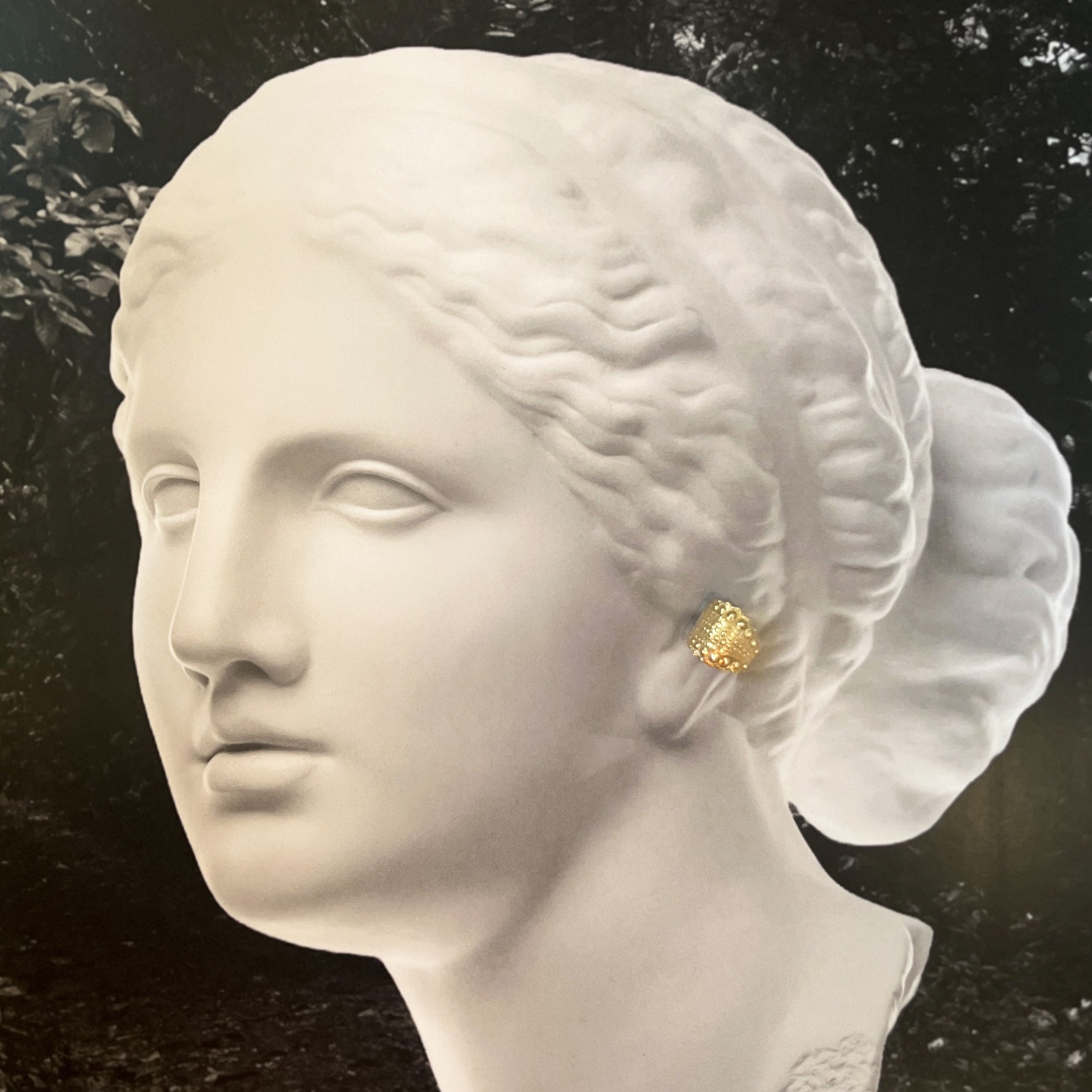 Greek bust wearing Kefi urchin ear cuff made by Stephanie Alman in NYC