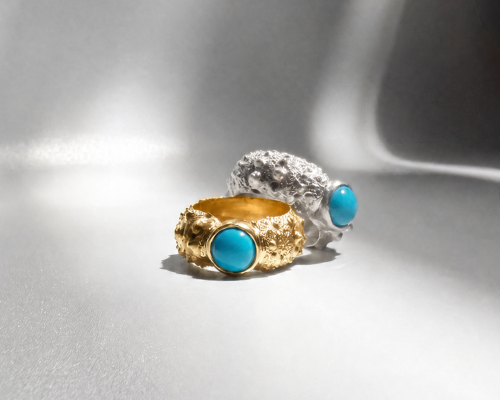 Galene Urchin Ring in sterling silver and gold vermeilfeaturing a bezel-set Sleeping Beauty turquoise stone inspired by the texture of sea urchin shells.