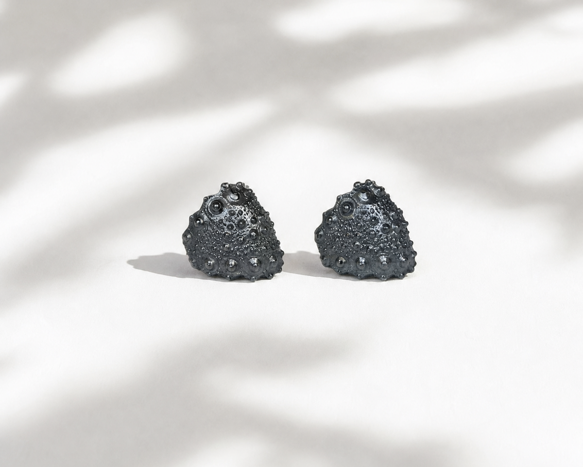 Galatea Tiny Urchin Earrings in oxidized sterling silver with a richly textured sea urchin-inspired design, handcrafted in New York by Kefi.