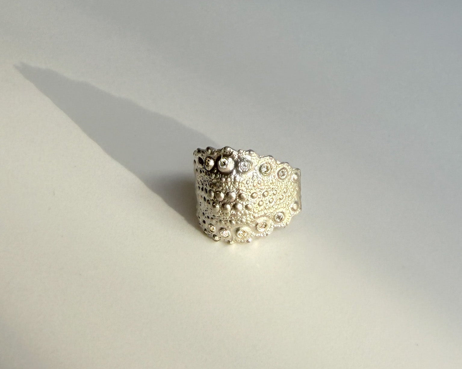 Urchin Cuff in sterling silver with diamonds, natural sea urchin texture and bold cuff form