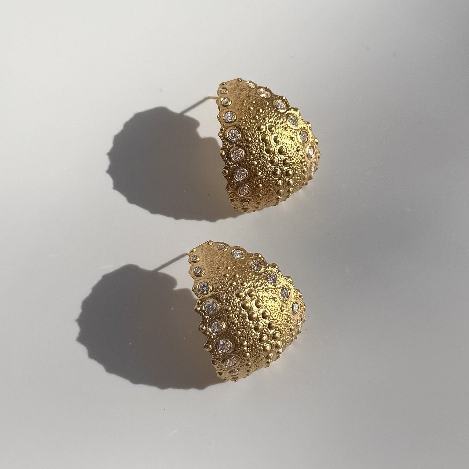 Urchin Hoop Earrings in gold vermeil and diamonds with preserved sea urchin shell texture and classic hoop silhouette by Kefi