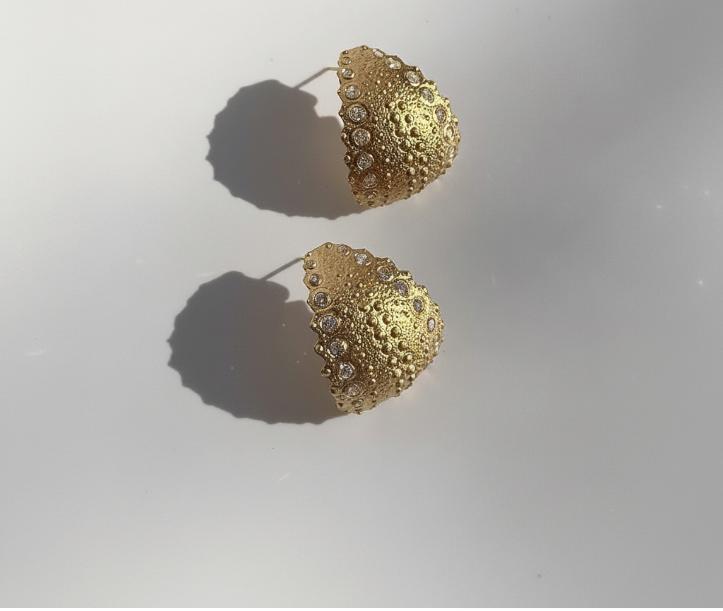 Urchin Statement Hoop Earrings in gold vermeil featuring diamond accents and sculptural sea urchin-inspired textures, handcrafted in New York City.
